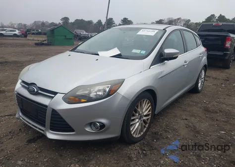 2014 Ford Focus Titanium from USA, damaged, VIN 1FADP3N2XEL125611